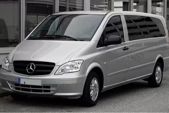 Silver Mercedes minivan ready for comfortable private transfer service on the Sorrento to Naples route in Italy