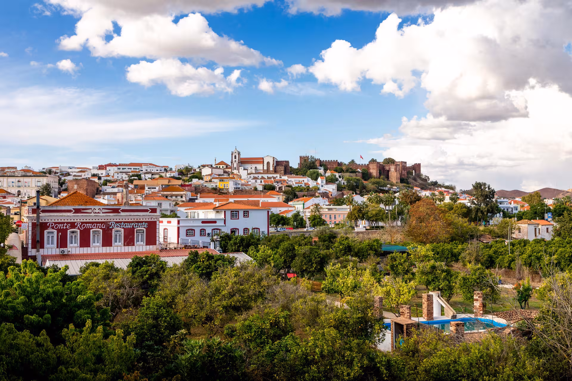 Panoramic view of Silves old town, castle and orange groves on Algarve à la Carte cultural and countryside tour