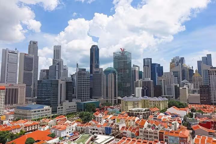 Panoramic view of Singapore CBD skyline and historic Chinatown shophouses on an 8-hour private tour