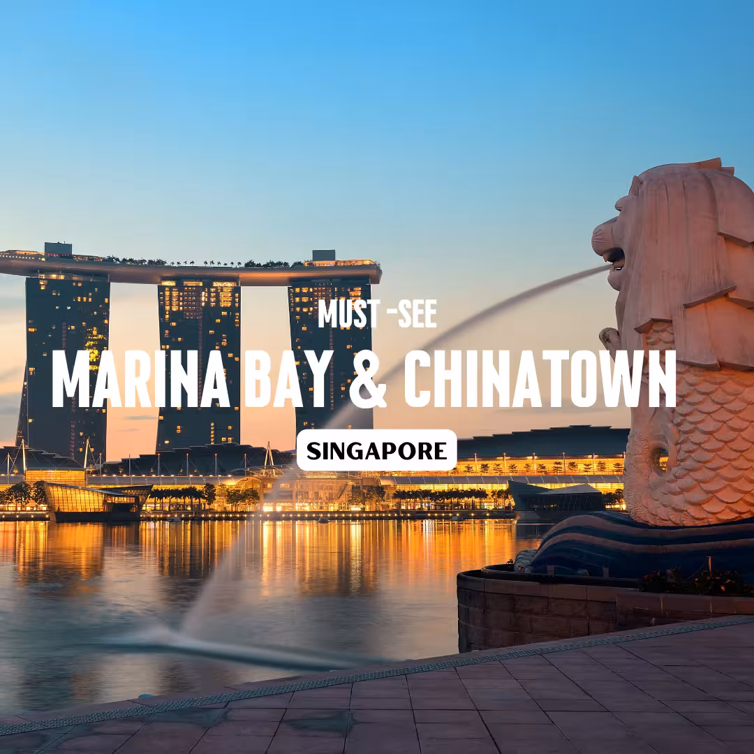 View of Marina Bay Sands and Merlion statue at dusk, showcasing the must-see attractions in Singapore's Marina Bay and Chinatown.
