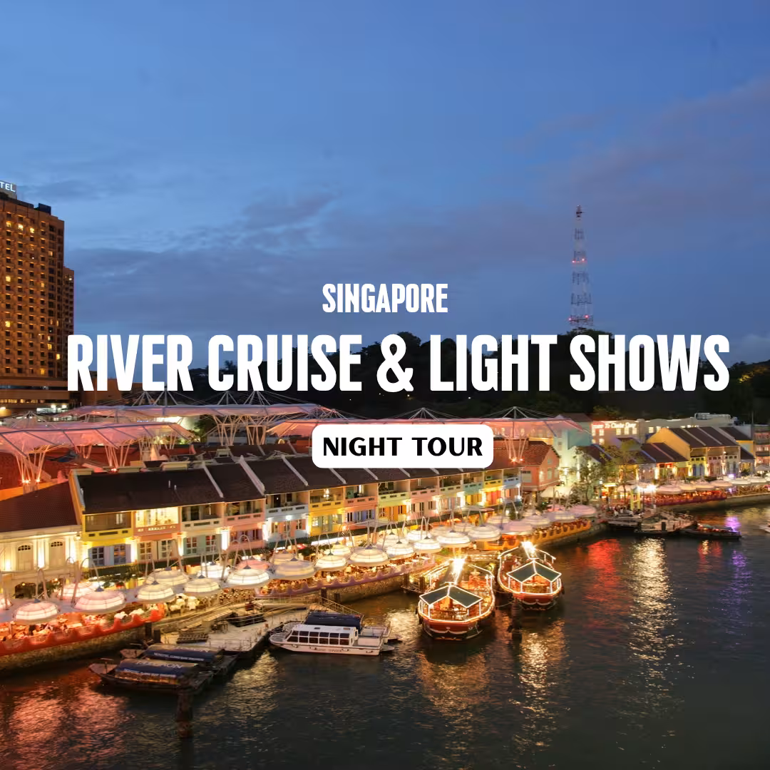 Scenic view of Singapore's vibrant riverfront, illuminated for a night cruise and light show extravaganza.