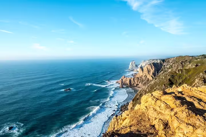 Stunning coastal cliffs in Sintra-Cascais Natural Park, perfect for exploring hidden gems on a private tour with wine tasting.