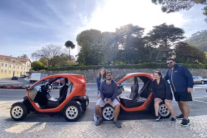 Group with two Renault Twizy cars in Sintra, perfect self-drive tour for monuments, town center and coast