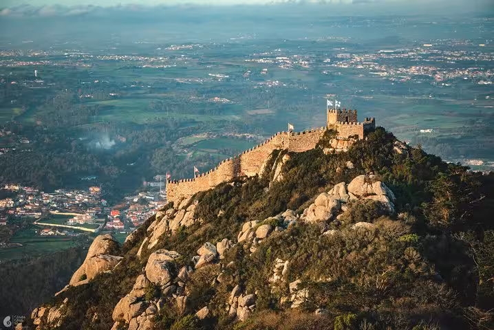 Panoramic view of Sintra Moorish Castle on a hilltop, ideal self-drive monuments and coast tour