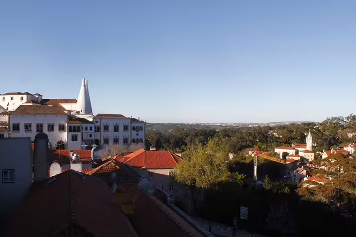 Scenic view of Sintra rooftops and lush landscape, perfect for a private tour from Lisbon to explore Pena and Regaleira Palaces.