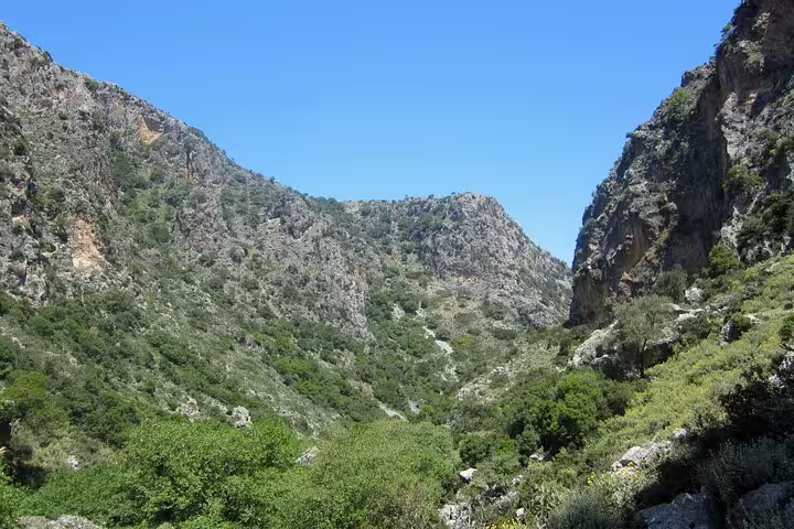 View of the lush, rugged landscape in Sirikari Gorge, perfect for a private hiking adventure near Polyrrinia.