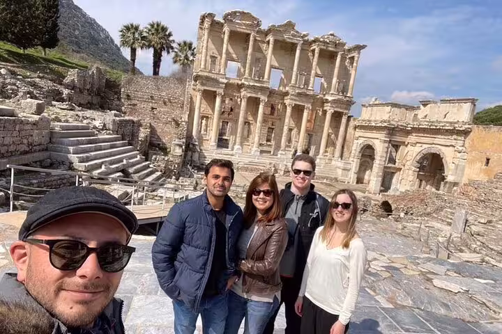 Group enjoying a skip-the-line Ephesus tour in front of the ancient Library of Celsus, Izmir.