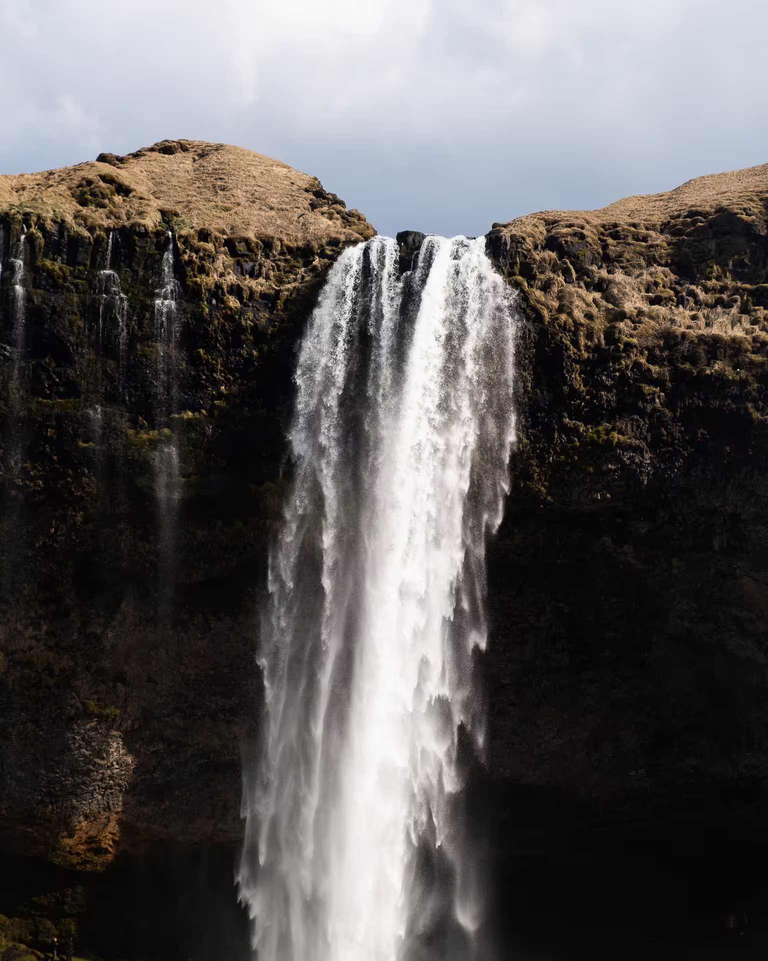 Powerful Skógafoss waterfall cascading down volcanic cliffs on Iceland's South Coast