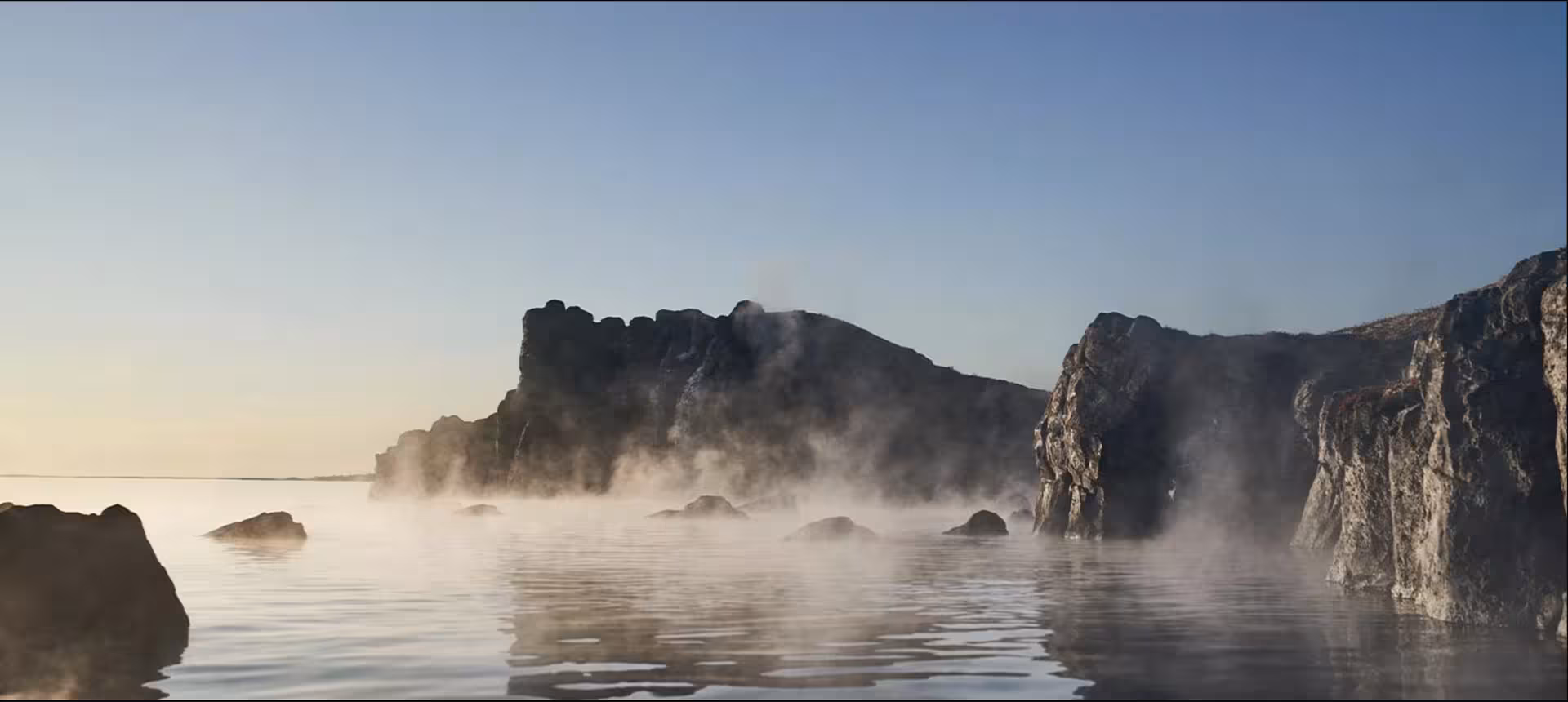Misty geothermal waters at Sky Lagoon with rocky cliffs, ideal for a private transfer experience in Reykjavik, Iceland.