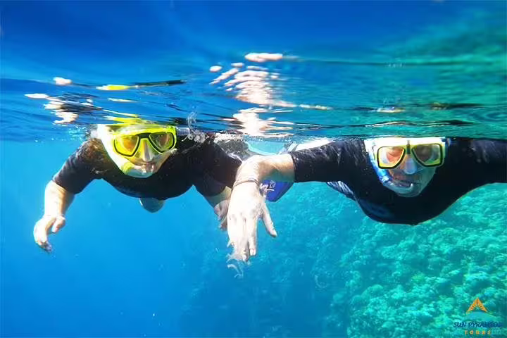 Snorkeling in Hurghada Red Sea over coral reef, included in 12 day 11 night Egypt tour with Luxor and Aswan