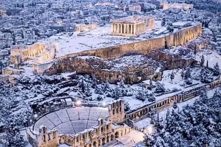 Snow-covered Acropolis and Parthenon above Athens, scenic viewpoint on a private half-day Acropolis tour