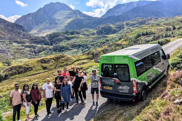 Small-group minibus stop in Snowdonia mountains, scenic drive on the Snowdonia & 3 Castles Tour