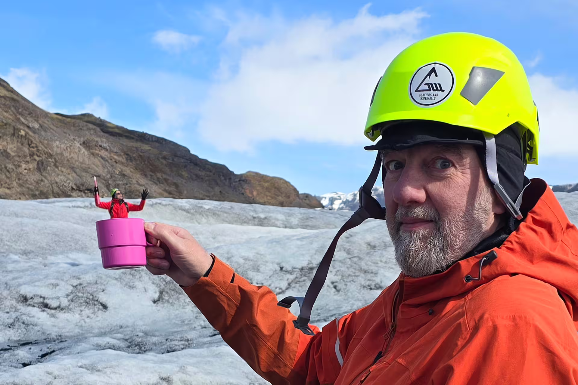 Playing with illusion on the glacier, "little man - big man".