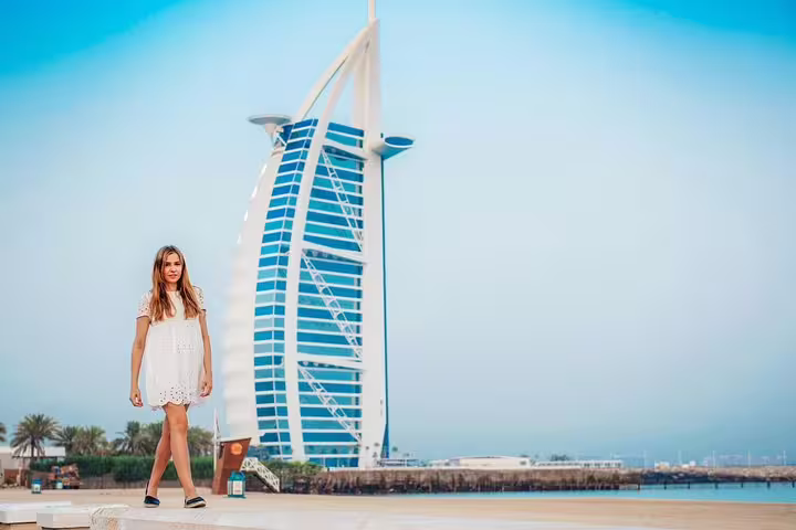 Solo traveler portrait with Burj Al Arab backdrop, Dubai private tour with personal travel photographer