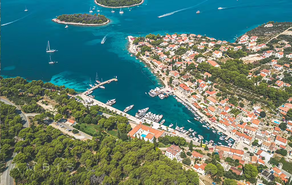 Aerial view of Solta island harbor and turquoise bay, ideal stop on Blue Lagoon private relaxing boat tour