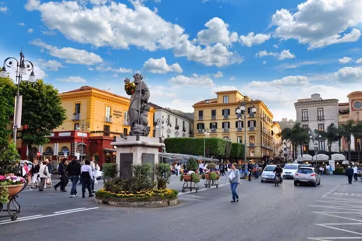 Bustling city center in Sorrento with lively atmosphere, perfect starting point for private transfer to Rome.