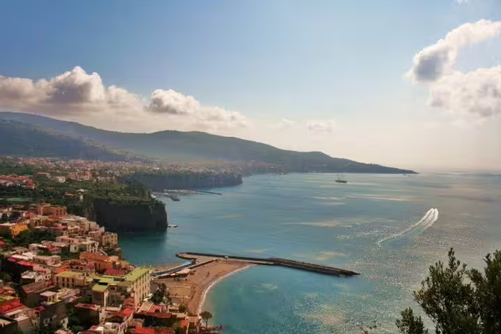 Panoramic view of Sorrento coastline, marina and sparkling Tyrrhenian Sea on a private full day tour of the Amalfi Coast