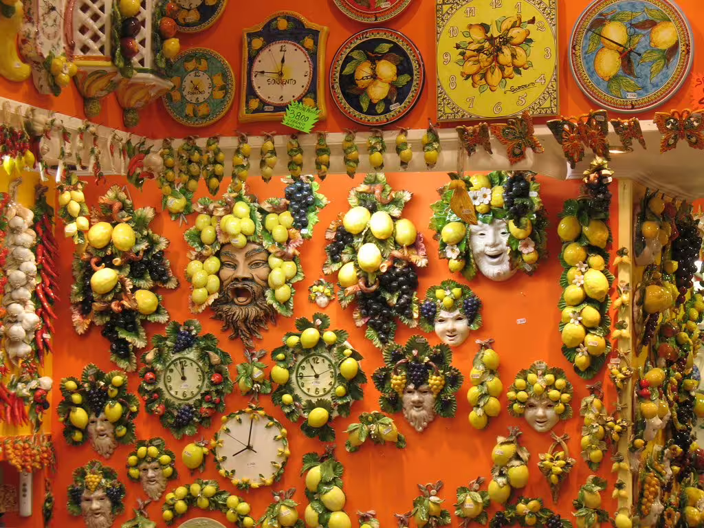 Colorful Sorrento shop with hand-painted lemon ceramics and clocks, a vibrant stop on the Punta Sant’Elia trekking weekend