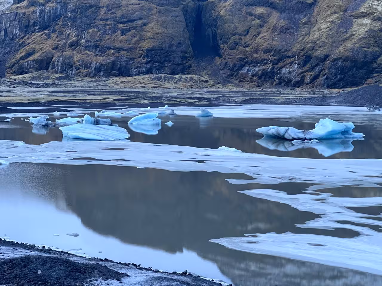 Icebergs floating on a glacial lagoon stop on South Coast private tour from Reykjavik, Iceland scenic photo