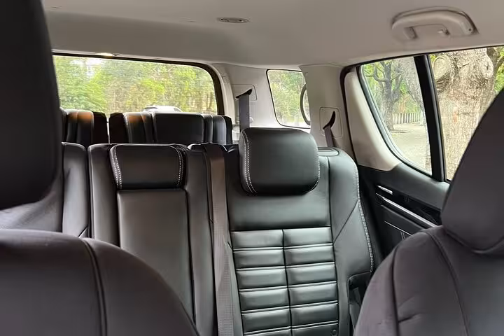 Luxurious leather interior of private tour vehicle for South Coast exploration with comfort and style.