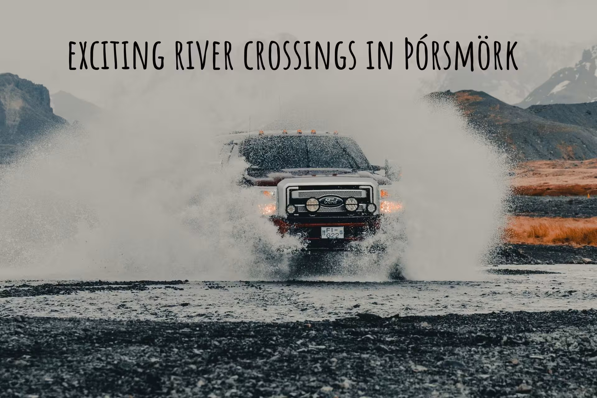 Ford 4x4 truck splashing through glacial river crossing in Þórsmörk, Iceland highlands