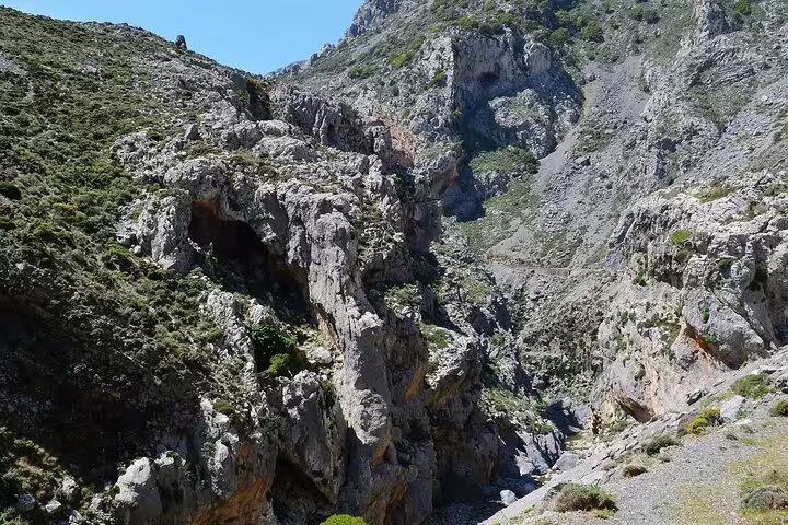 Majestic rocky landscape with deep gorges and rugged terrain in Southwest Crete's hiking route.
