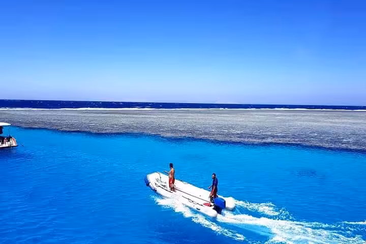 Speedboat cruising over turquoise Red Sea toward Abu Dabab Bay National Park for swim with turtles from Hurghada
