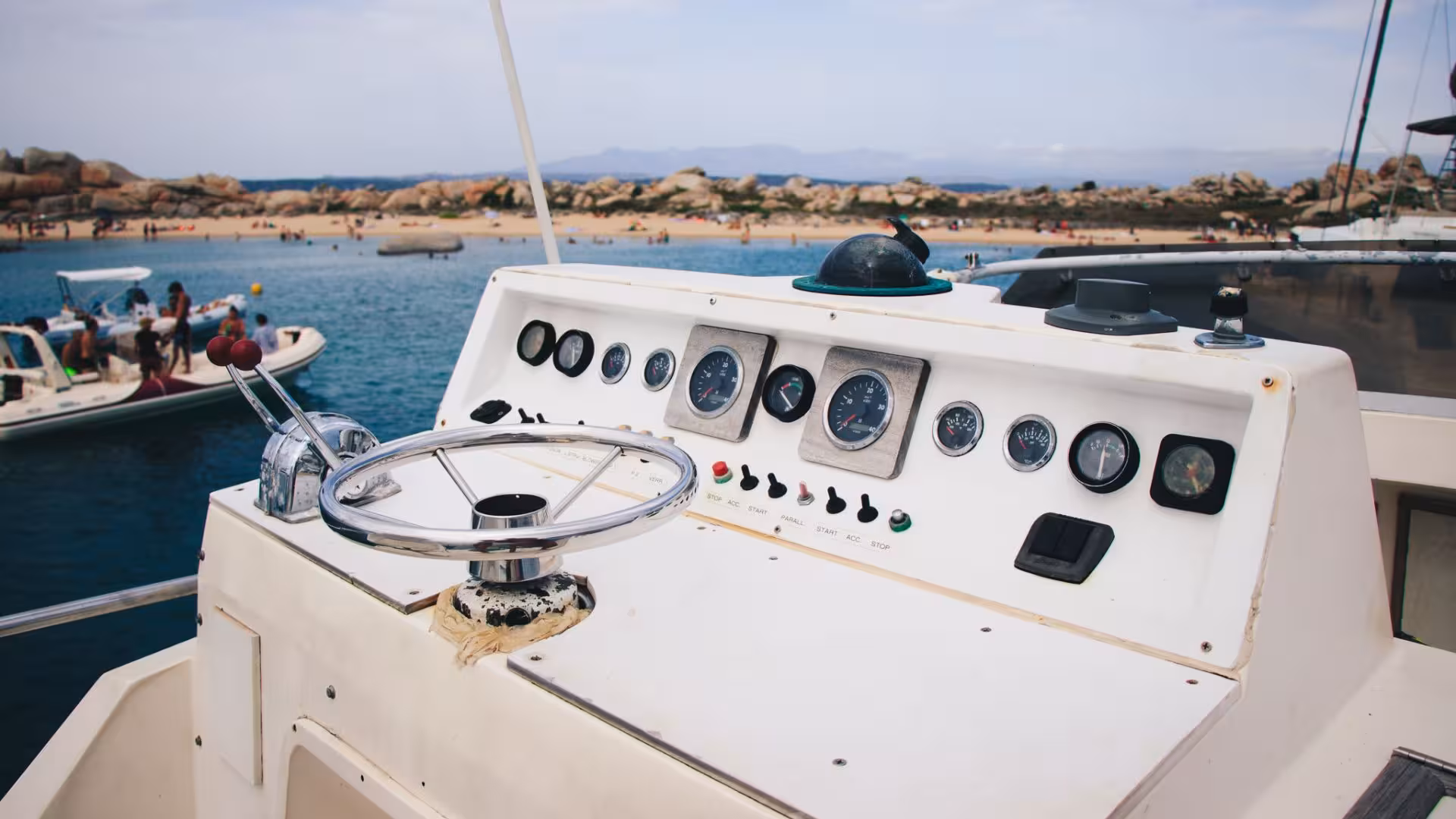 Navigate the seas with a modern speedboat control panel on a Corsica tour from Santa Teresa di Gallura.