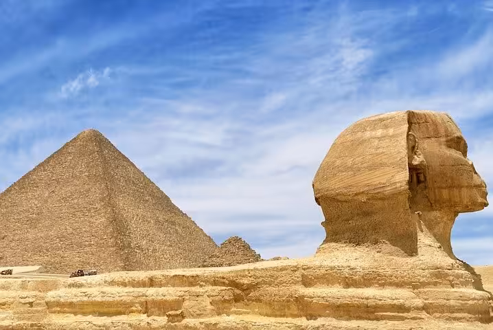 Great Sphinx and Giza Pyramid under blue sky, highlight of a private 2-day Cairo tour from Hurghada