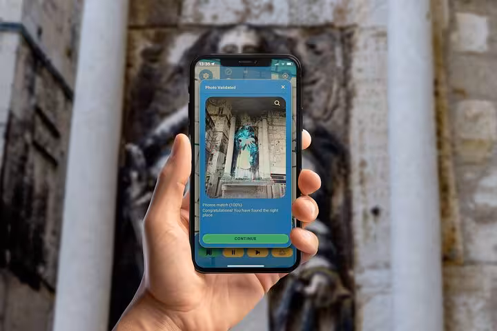 Smartphone screen showing photo validation feature of self-guided walking tour app exploring Split Croatia landmarks