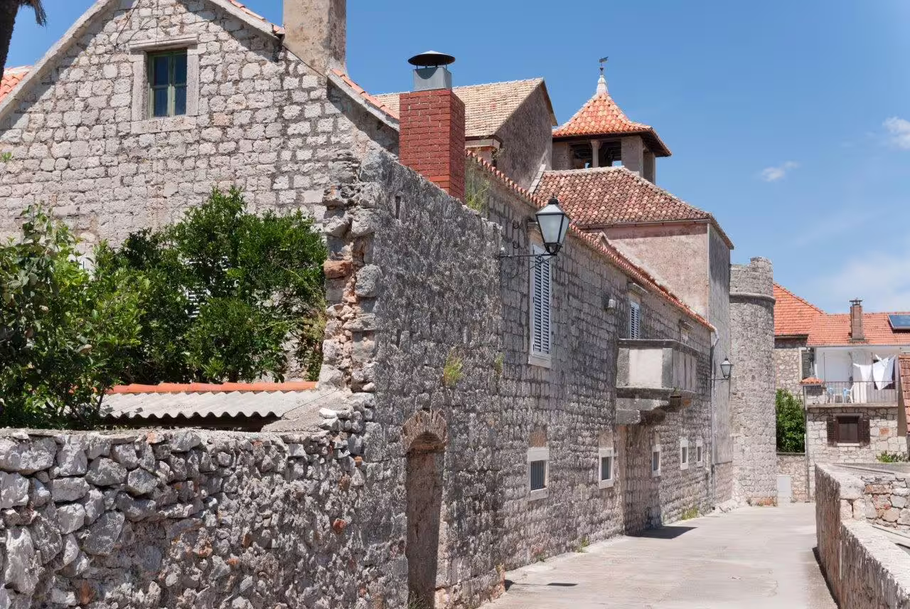 Quiet stone lane with traditional Dalmatian houses near Split, explored on an Escape to Split 3-day private tour