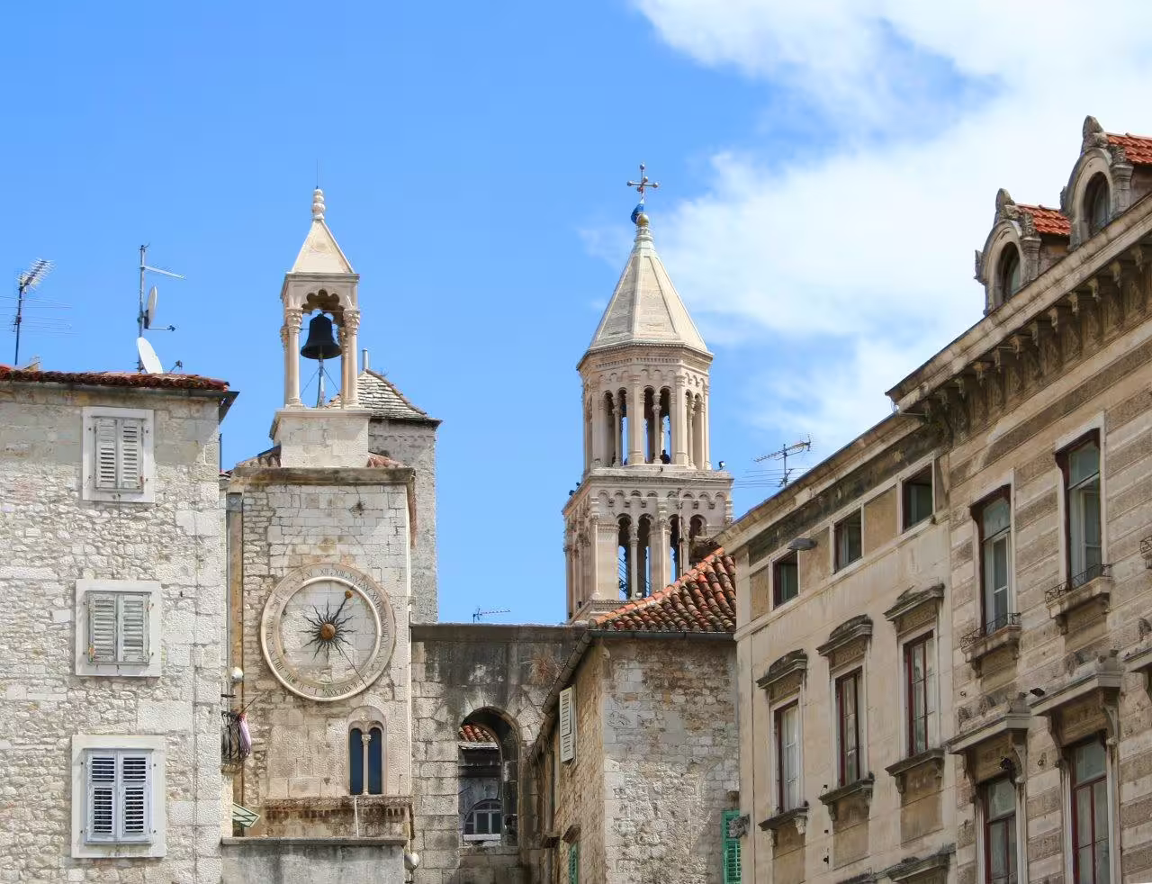 Split Old Town stone buildings with clock and bell tower, a highlight on Escape to Split 3-day private tour