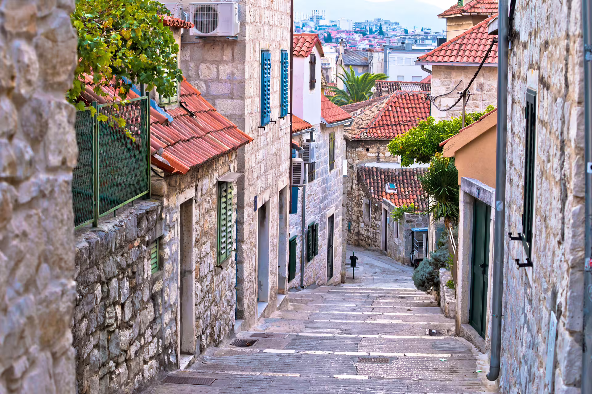 Narrow stone lane with red rooftops in Split Old Town, perfect for a 1-day self-guided audioguide walk