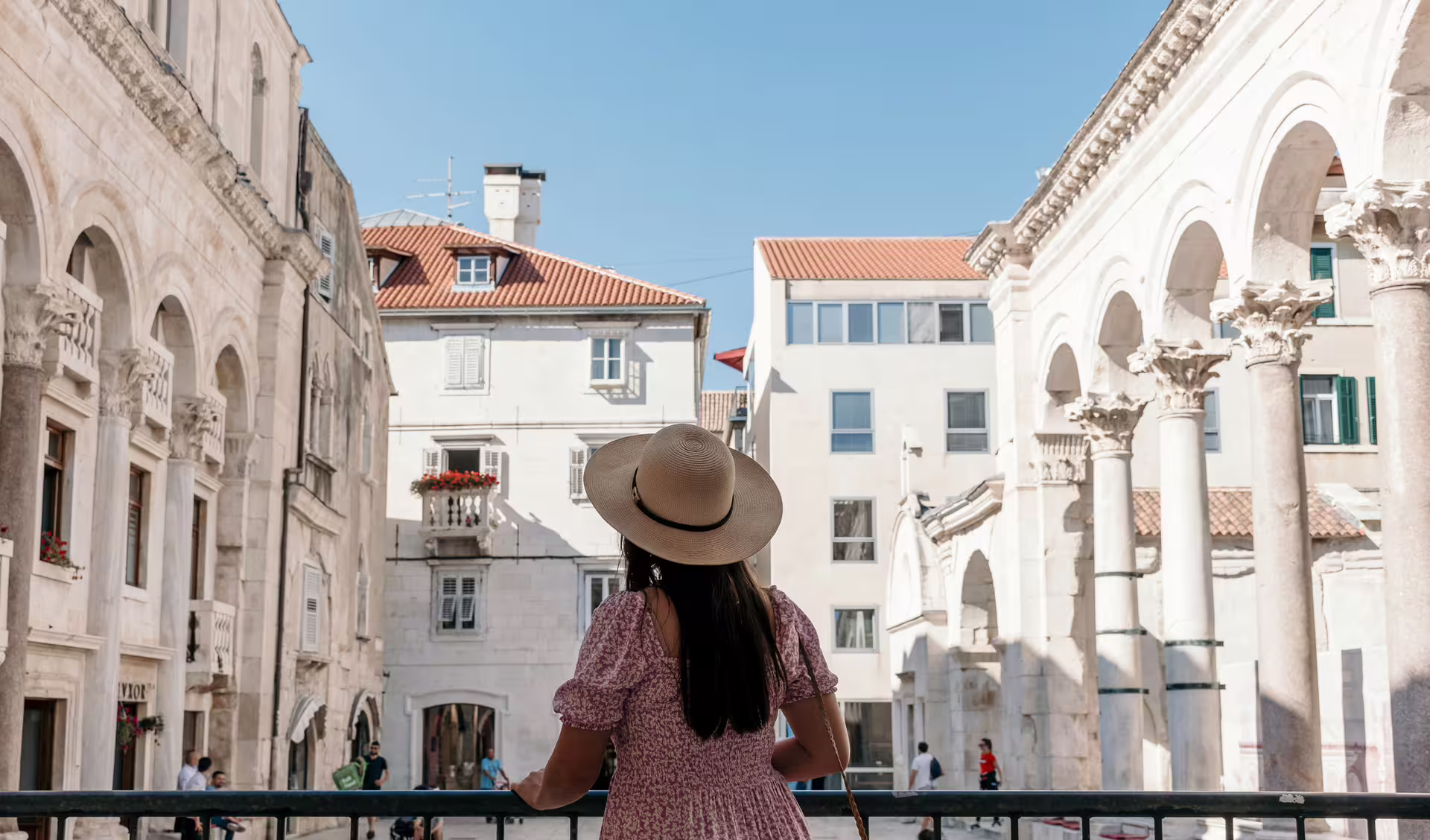 Traveler in Split’s Peristyle at Diocletian’s Palace, ideal for a 1-day walking tour audioguide