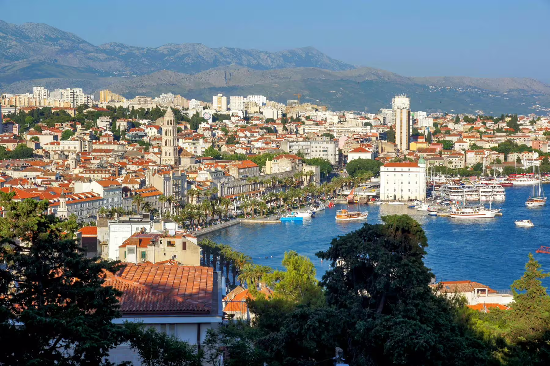 Panoramic Split waterfront and Old Town with boats in the harbor, visited on Trogir and Split day tour