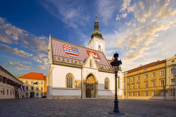 Zagreb St Mark’s Church with colorful tiled roof at sunset, highlight of 7-day private Croatia tour itinerary