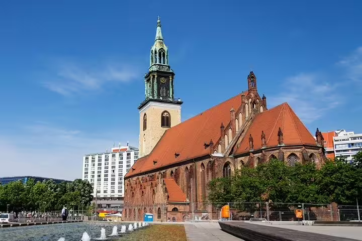 St. Mary's Church Berlin with Gothic tower and red roof near Alexanderplatz on a sunny day