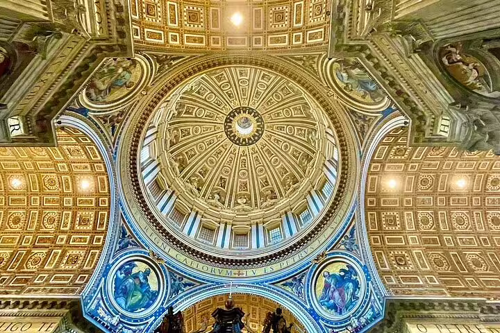 Upward view of St Peter’s Basilica dome interior, ornate mosaics and golden ceiling on exclusive early morning VIP climb tour