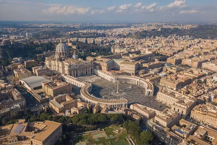 Aerial view of St Peter’s Basilica and Vatican City, showcasing hosted access on Rome walking tour