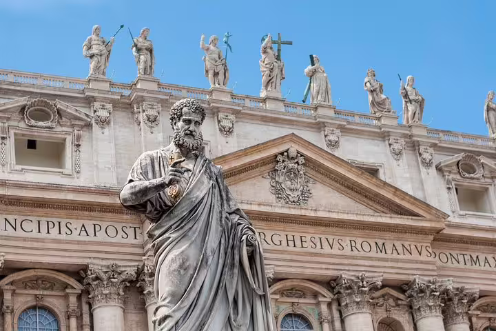 Close-up of St Peter’s Basilica façade and apostle statues on Vatican Museum Sistine Chapel fast track guided tour
