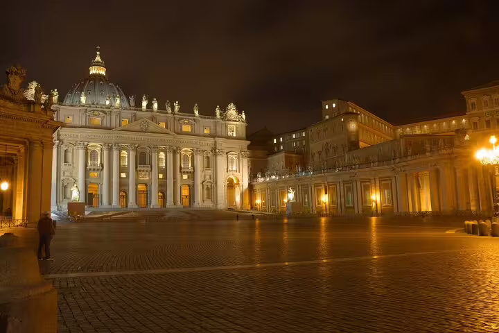 St Peters Basilica and St Peters Square at night, iconic Vatican City view on an expert guided tour