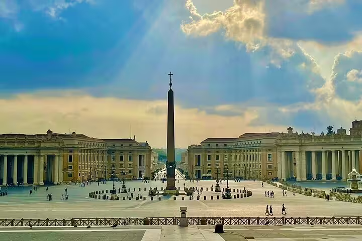 Sunlit St Peter's Square with Vatican obelisk and colonnades during a peaceful early morning VIP tour