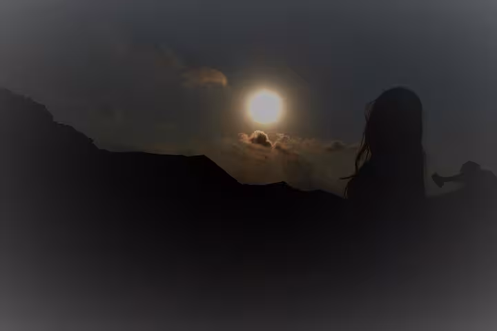 Moonlit desert stargazing in Hurghada with silhouetted traveler, part of Jeep safari and Bedouin dinner
