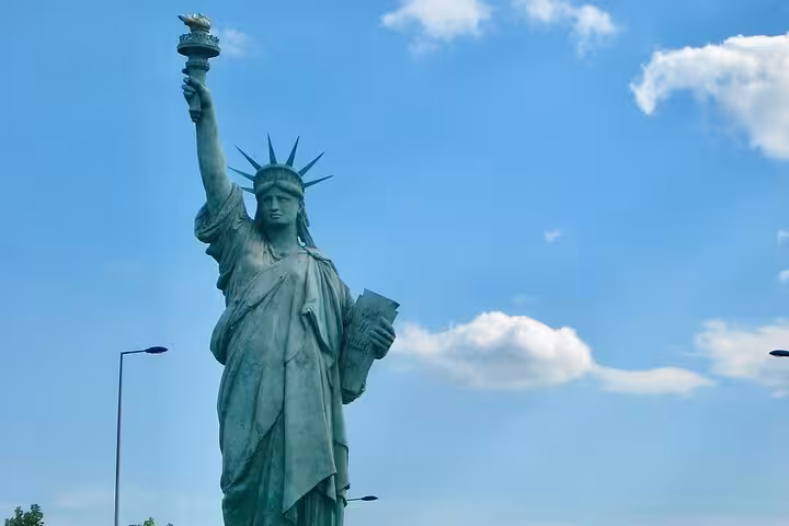 Statue of Liberty replica under blue sky near Strasbourg transfer route to Colmar