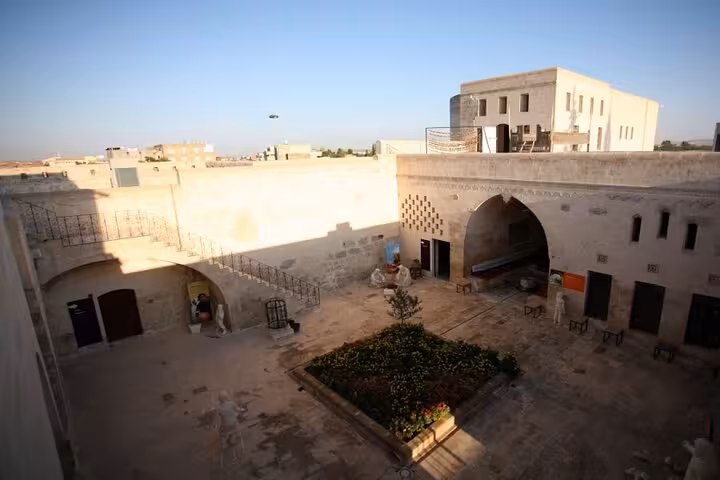 Traditional stone courtyard hotel in Sanliurfa for 1-night stay on Mount Nemrut and Gobekli Tepe tour from Istanbul