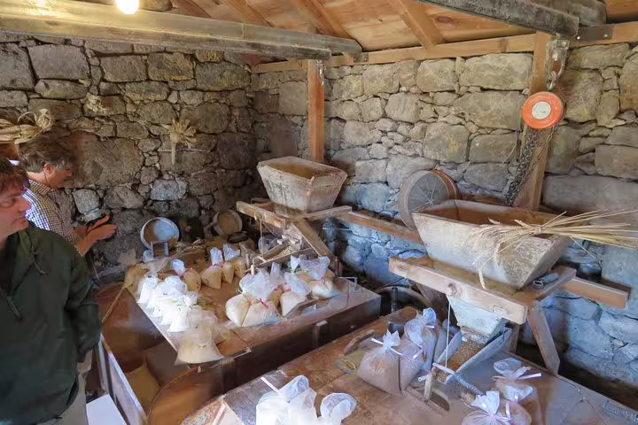 Traditional stone mill interior in Santana, highlighting local culture on the Northeast meet the locals tour.