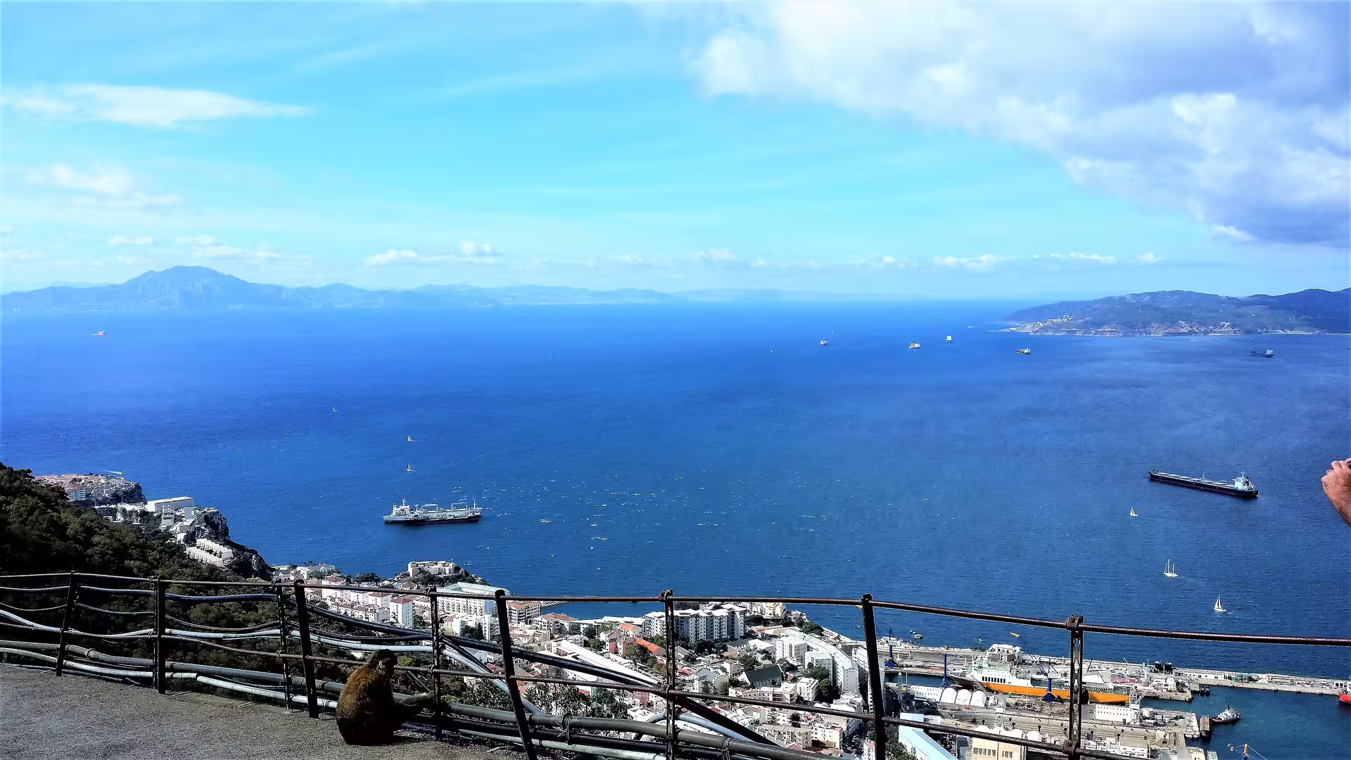 Panoramic Strait of Gibraltar view from the Rock, with ships and coastline, on a private tour from Costa del Sol