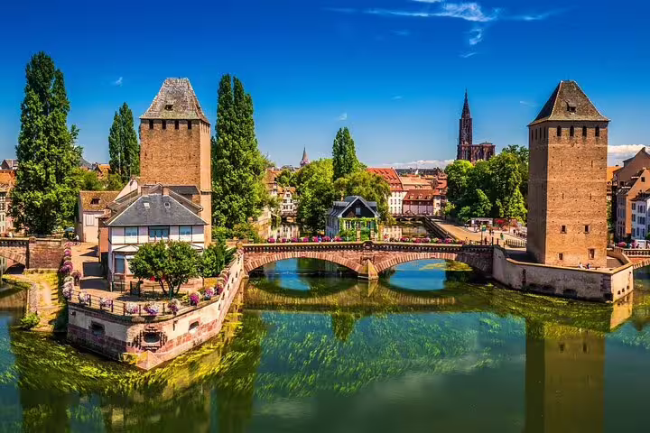 Ponts Couverts medieval towers and bridges over the Ill River in Strasbourg, France on a sunny day