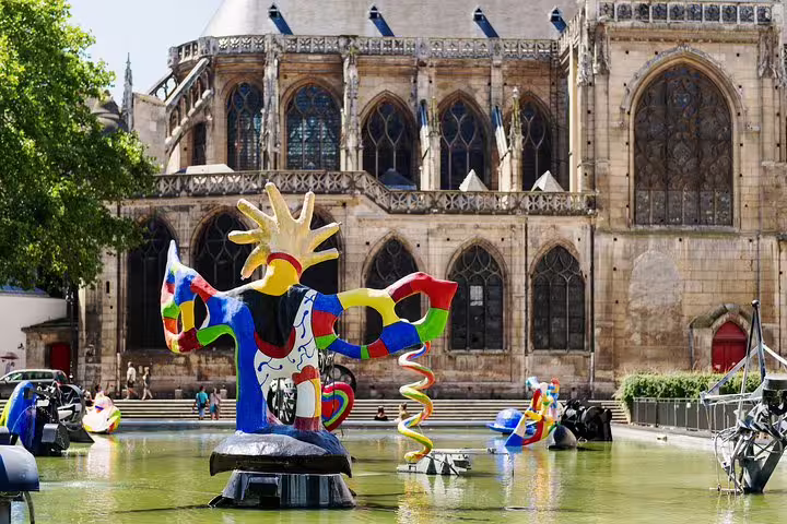 Colorful sculptures in the Stravinsky Fountain near Centre Pompidou, perfect spot for a Paris private family tour with kids.
