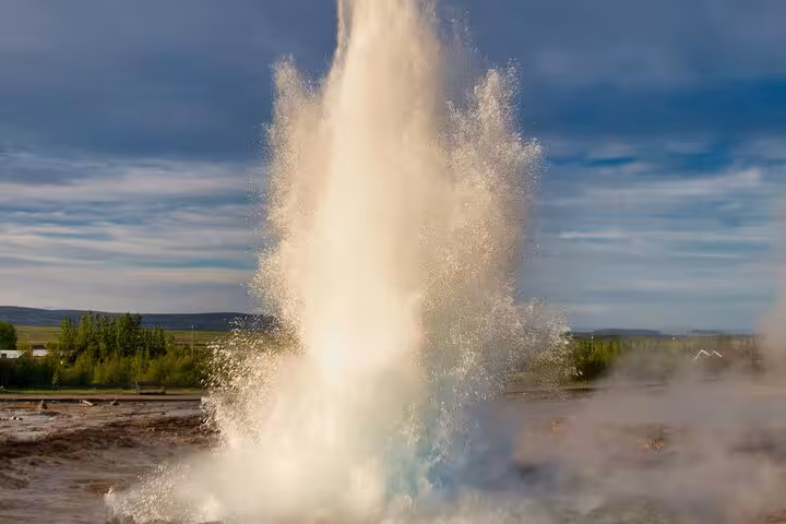 Strokkur geyser erupting with powerful water jet at Golden Circle, Iceland